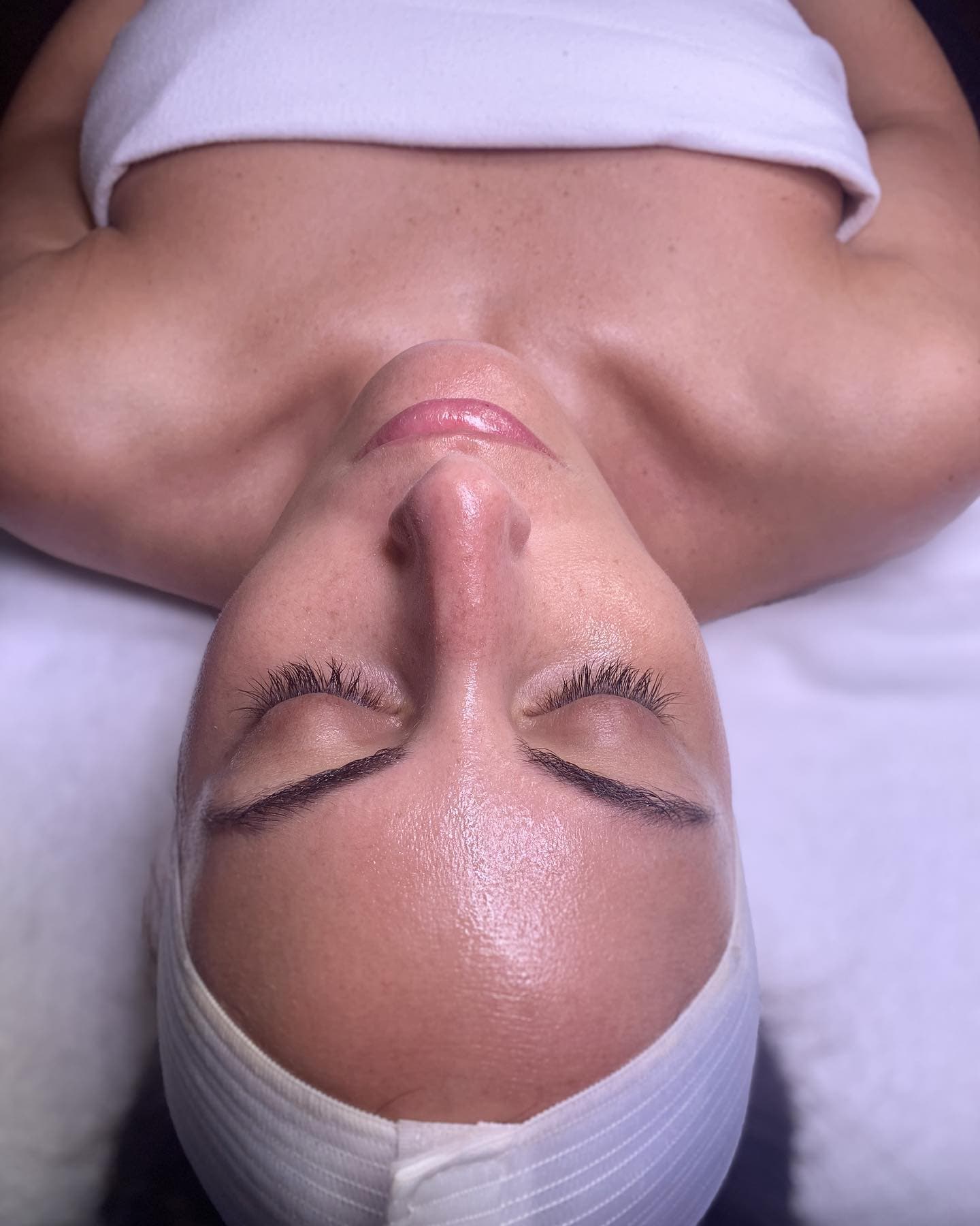 Professional facial treatment at Shear Artistry spa